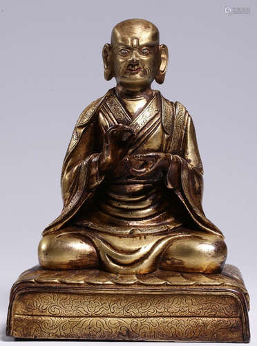 A GILT BRONZE CAST BUDDHA STATUE