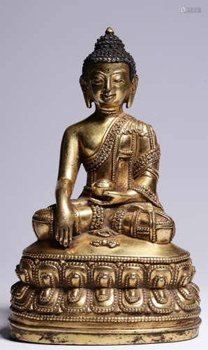 A GILT BRONZE CAST SAKYAMUNI BUDDHA STATUE