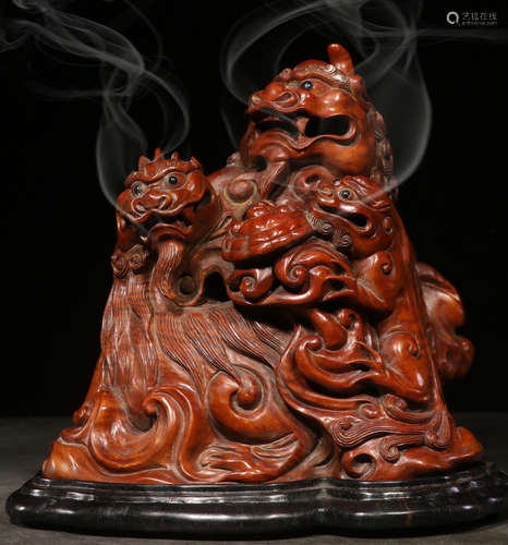 A HUANGYANG WOOD CARVED INCENSE HOLDER