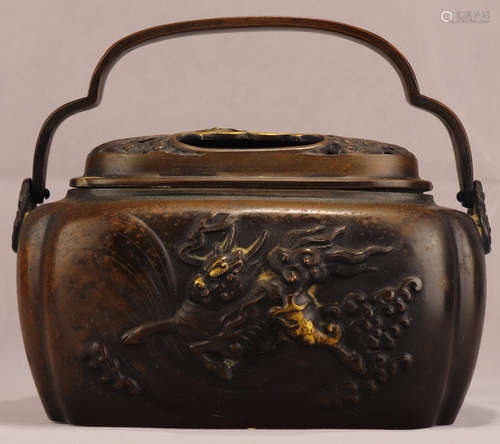 A GILT BRONZE CAST BEAST PATTERN CENSER