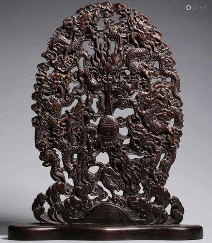 A SUANZHI WOOD CARVED DRAGON PATTERN SCREEN