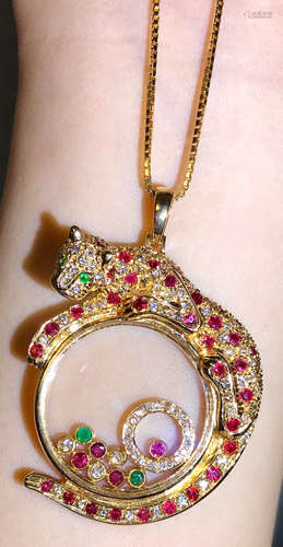 A 18K RUBY DIAMOND PENDANT