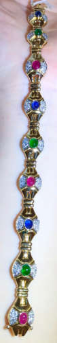 A 18K RUBY SAPPHIRE WITH EMERALD DIAMOND BRACELET