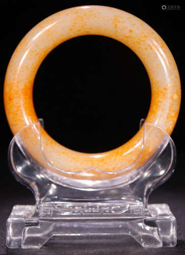 A HETIAN JADE CARVED BANGLE