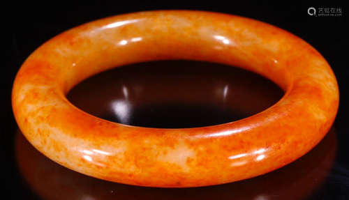 A HETIAN JADE CARVED BANGLE