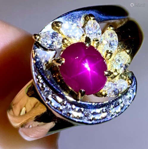 A 18K PLATINUM WITH RUBY DIAMOND RING