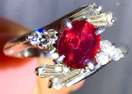 A PLATINUM RUBY DIAMOND RING