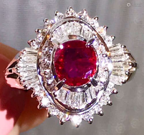 A PLATINUM RUBY DIAMOND RING