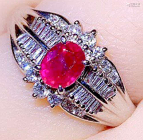 A PLATINUM WITH RUBY DIAMOND RING