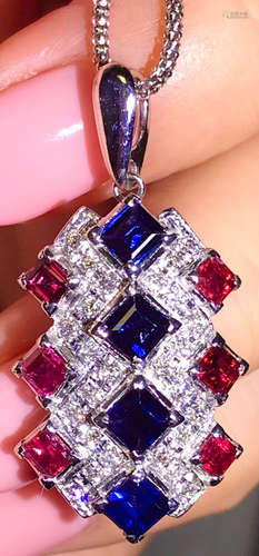 A 18K RUBY WITH SAPPHIRE DIAMOND BROOCH