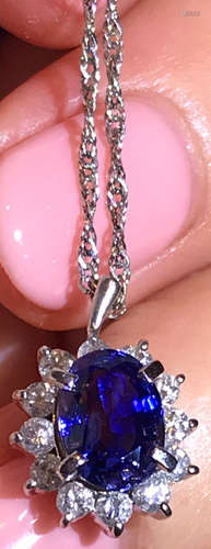 A PLATINUM WITH SAPPHIRE DIAMOND PENDANT