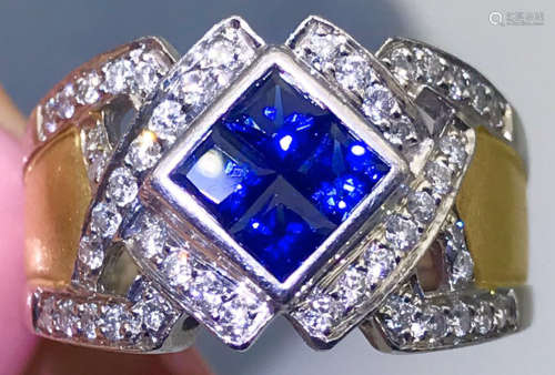 A 18K SAPPHIRE WITH DIAMOND PLATINUM RING