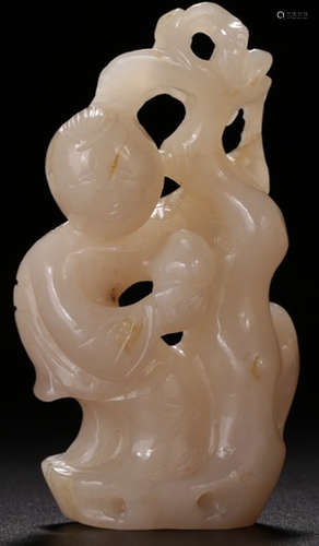 A HETIAN JADE CARVED CHILD SHAPED PENDANT