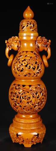 A YELLOW JADE CARVED DRAGON PATTERN HOLLOW VASE