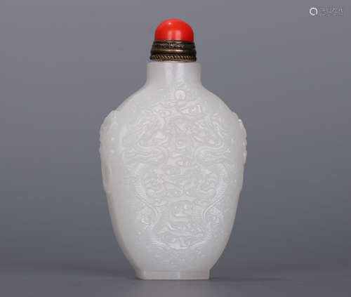 A Qing dynasty Carved Hetian Jade Snuff Bottle