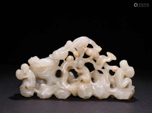 A Qing dynasty Carved Hetian Jade Ornament, Monkey
