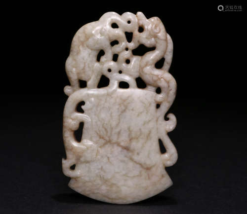 A Ming Dynasty Carved Hetian Jade Pendant
