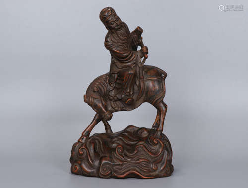 A Qing Dynasty Carved Agarwood Figure Ornament, Zhang Guorong