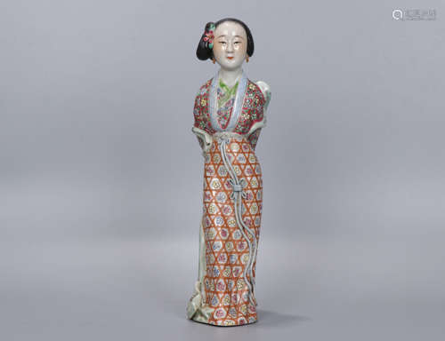 A Qing dynasty Famille Rose Porcelain Figure Ornament