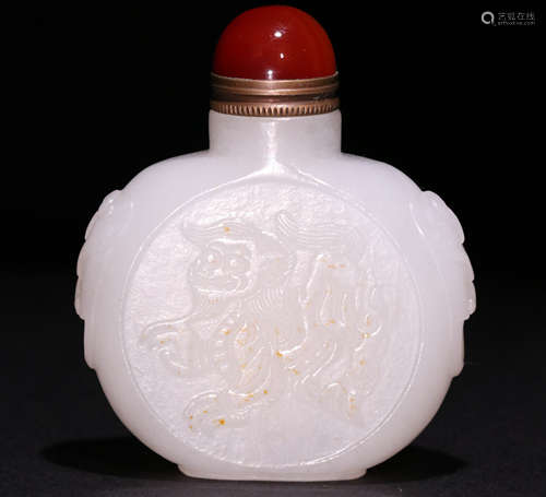 A Qing dynasty Carved Hetian Jade Snuff Bottle