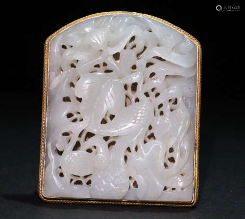 A Liao dynasty Carved Hetian Jade Pendant, plated with gold