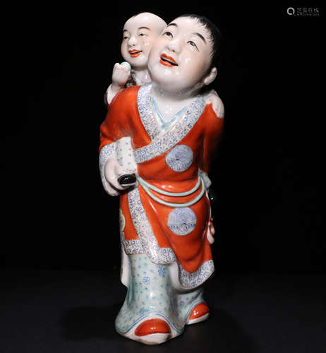 A Qing dynasty Famille Rose Porcelain Figure Ornament