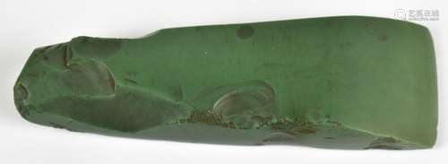 A Maori green stone adze, length 9.5cm, previously dated as being circa 1830.