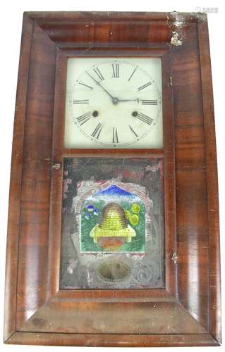 BREWSTER & CO OF BRISTOL, CONN. USA; a late 19th century American mahogany veneered ogee wall clock,