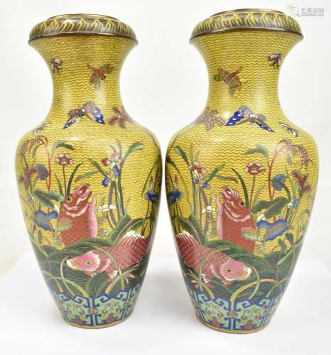 A good mirror pair of mid-late 19th century Chinese cloisonné enamel baluster vases with garlic