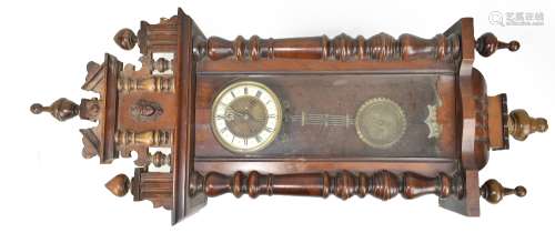 An early 20th century Vienna style wall clock in mahogany case, the circular dial with Roman