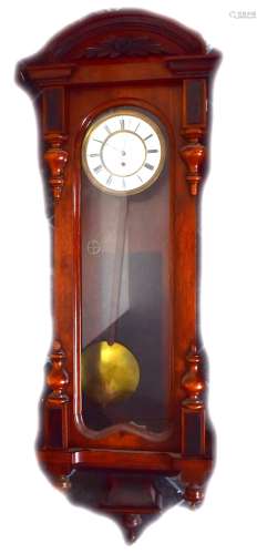 A late 19th century walnut and stained beech Vienna dial wall clock, the circular white enamelled