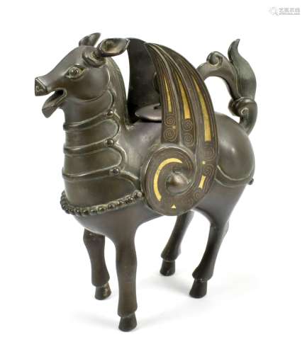 A Chinese bronze censer modelled as a mythical beast with git highlights and applied beaded and stud