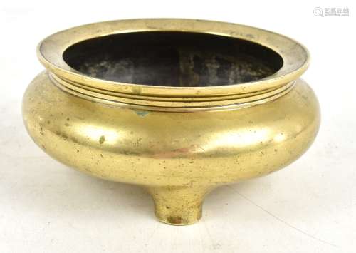 A 19th century Chinese bronze censer raised on three feet with apocryphal four character Xuande mark