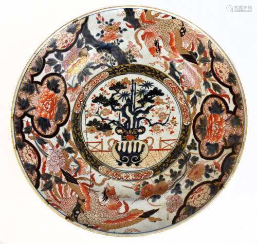 A very large late 17th century Japanese Arita charger decorated in the Imari palate, centred with an