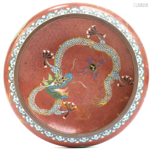 An early 20th century Chinese cloisonné enamel bowl decorated with three five claw dragons (one to