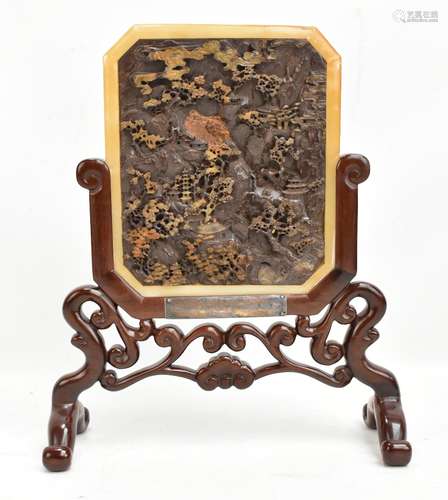 A Chinese Republic period Duan stone table screen with carved detail depicting temples in landscape,