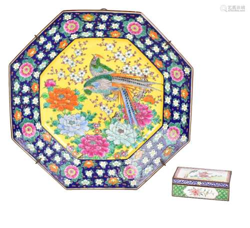A Japanese porcelain octagonal charger painted with pheasants perching on a prunus trees inside a