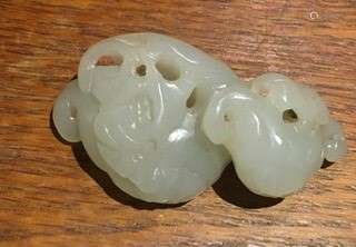 A Chinese pale jade carving of lingzhi sprigs and leaves, unmarked, length 6cm.Additional