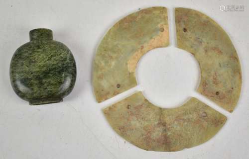 A sectional Chinese jade bi disc, each section with drilled holes for linking together, circa 2nd-