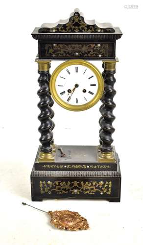 A Victorian ebonised wooden portico clock, with brass inlaid decoration, the circular enamelled dial