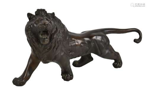 A large 20th century Japanese bronze figure of a lion standing for square, unmarked, length 44cm.