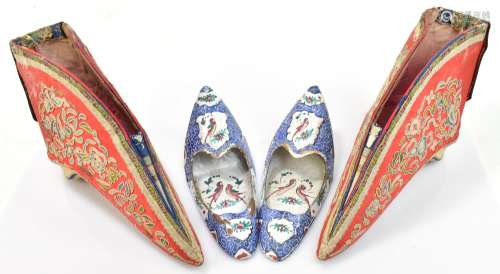 A pair of Chinese silk shoes with floral detail inside Greek key style border, length 11.5cm, with a