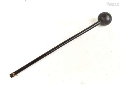 A Zulu hardwood executioner's knobkerrie, length 69cm.