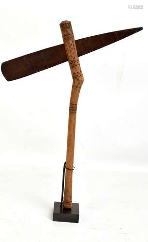 An African ceremonial axe, with later stand, height 42cm.