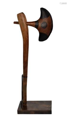 A South African ceremonial axe on stand, height 49cm.