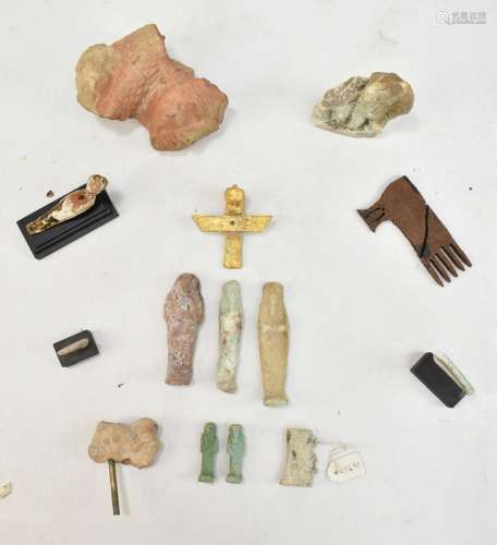 A small group of Egyptian fragment pieces including gilt heightened small wooden bird figure, etc,