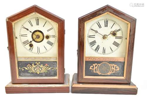 Two late 19th century German mantel clocks of arched form, both with circular dials set with Roman