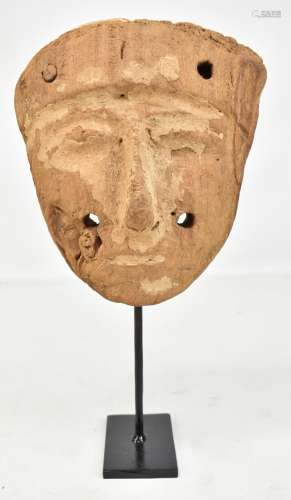 An Egyptian carved wooden mask now mounted with metal stand, mask height 23cm.Additional