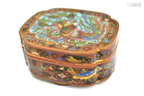 A Japanese cloisonné lidded trinket box of shaped outline, decorated with a mythical bird inside