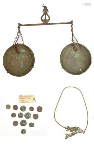 A quantity of Asante money, Ghanaian early 20th century, also a set of scales. Additional